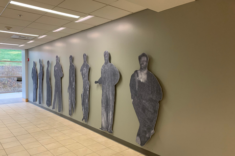 Wall of figure cut-outs